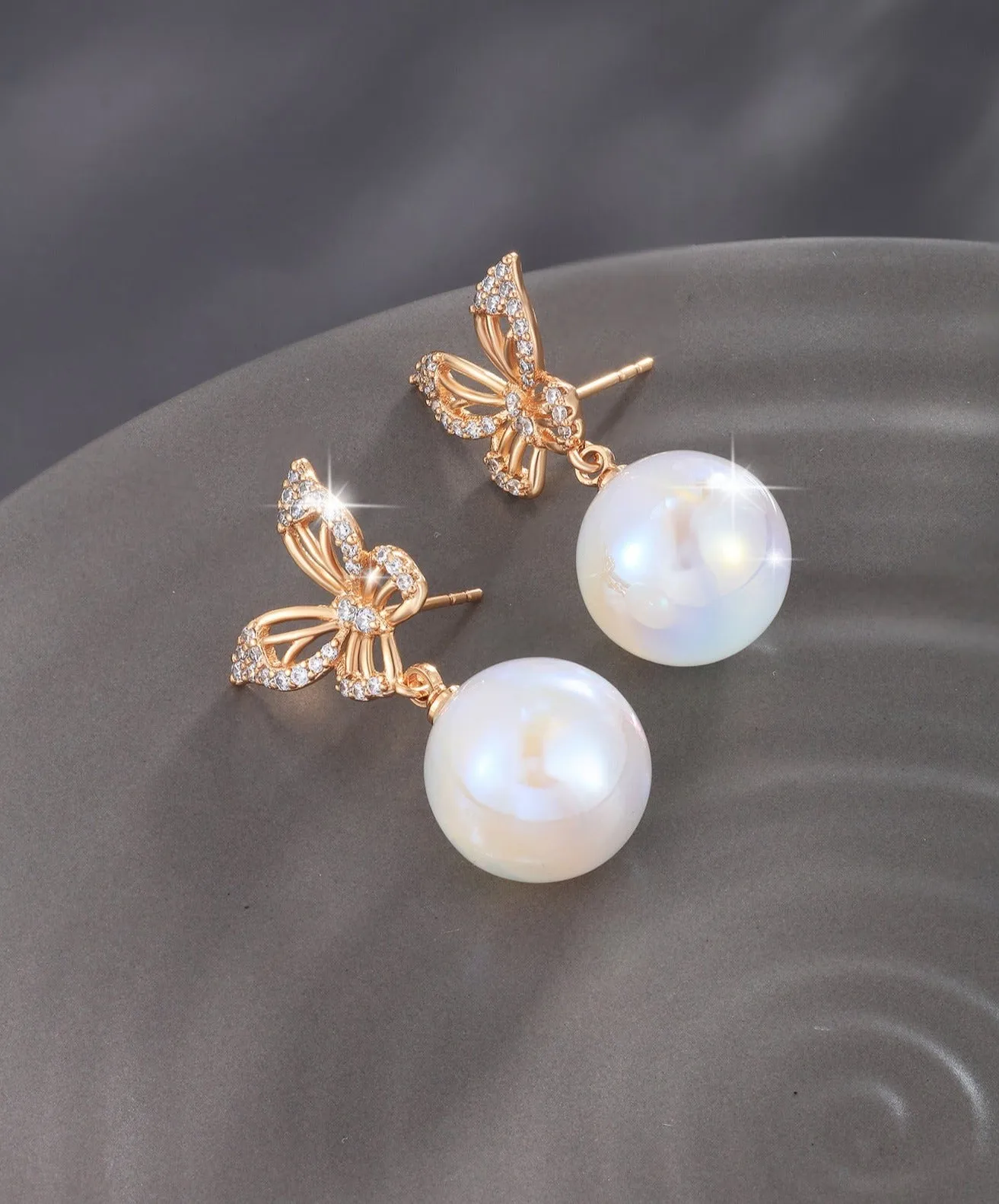 New Butterfly Mermaid Imitation Pearl Earrings Women's Simple Atmosphere Elegant Temperament Earrings