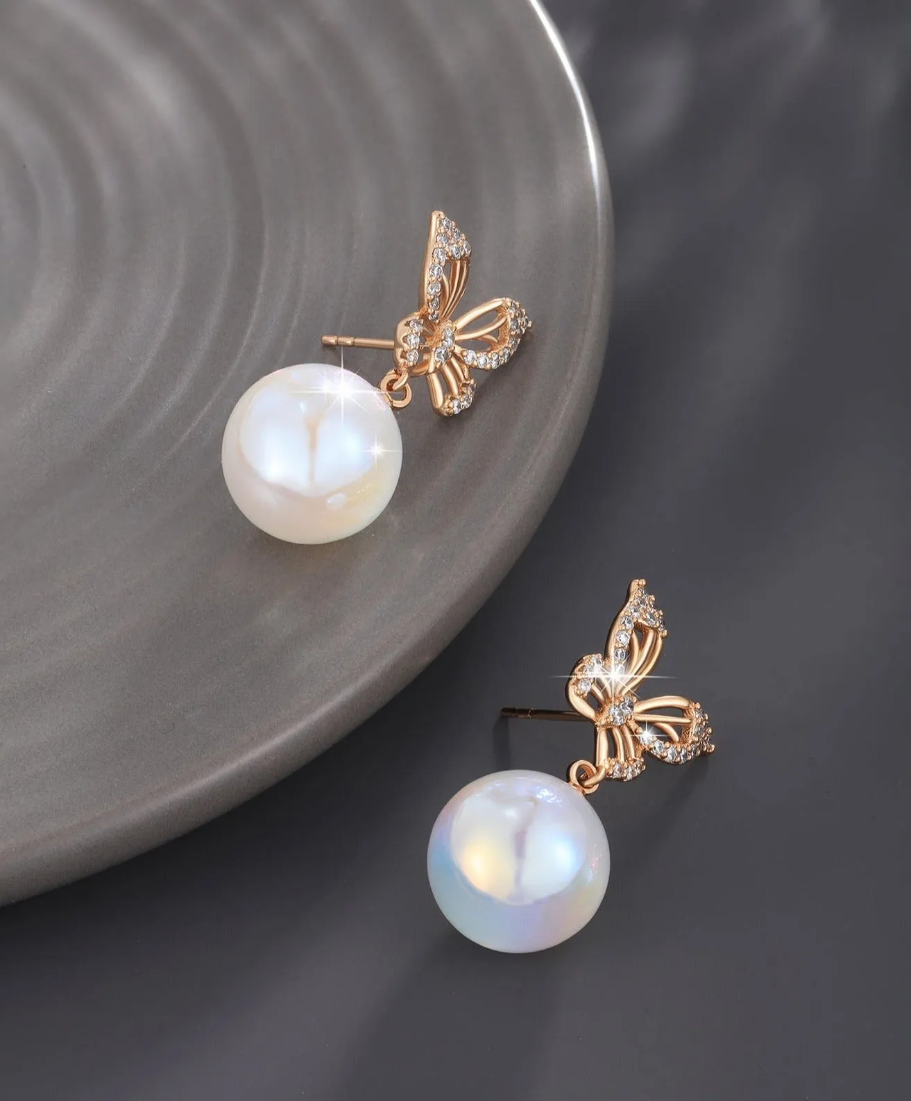 New Butterfly Mermaid Imitation Pearl Earrings Women's Simple Atmosphere Elegant Temperament Earrings